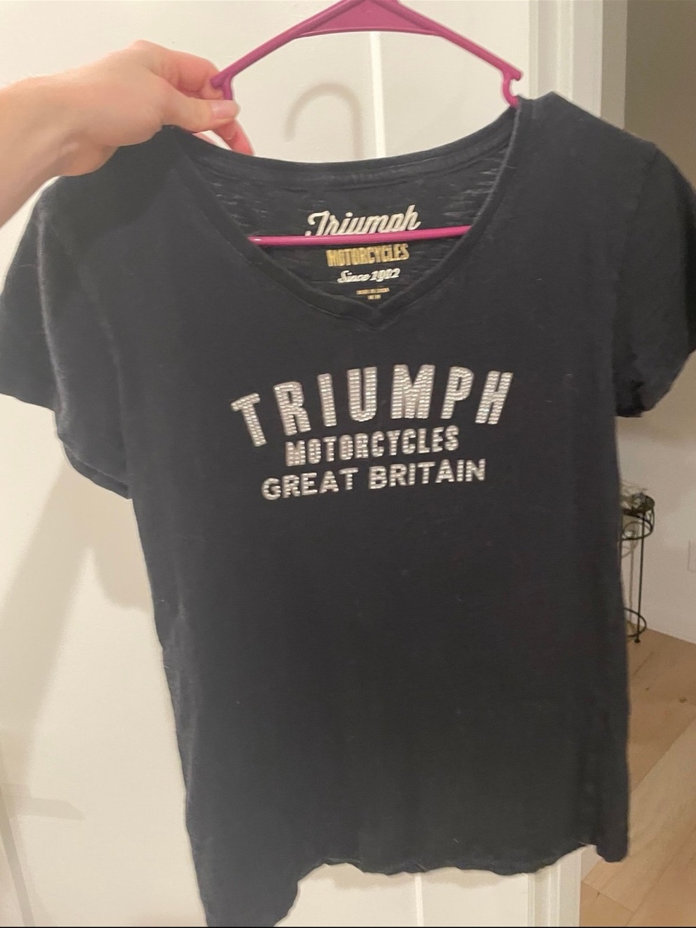 Triumph Black V‑Neck Logo T‑Shirt with Metallic Lettering